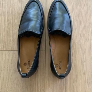 Black loafer style flats